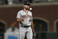 Arizona Diamondbacks pitcher Humberto Castellanos reacts after allowing a grand slam home run to San Francisco Giants' Mike Yastrzemski during the eighth inning of a baseball game in San Francisco, Tuesday, June 15, 2021. (AP Photo/Jeff Chiu)