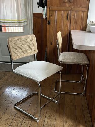 A  pair of modern bar stools people might assume came from CB2 or West Elm instead of Amazon