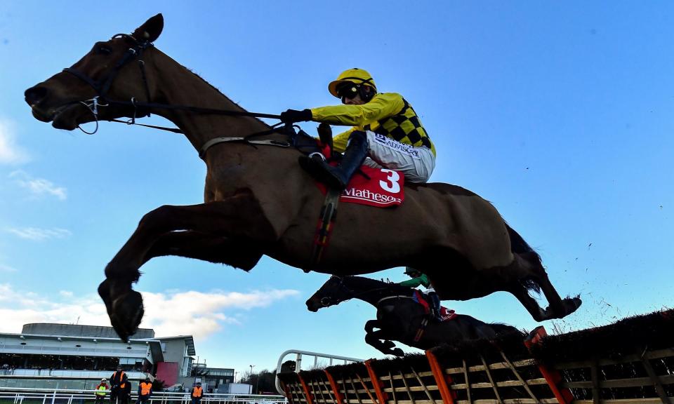 <span>State Man, one of the Irish trainer Willie Mullins’s charges and a favourite for Cheltenham, in action at the Leopardstown Christmas Festival in December 2023. </span><span>Photograph: Harry Murphy/Sportsfile/Getty Images</span>