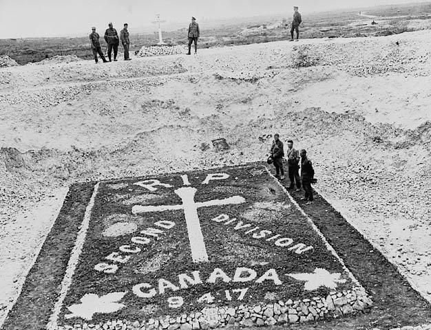 <p>Memorial to men of the 2nd Canadian Division who were killed at Vimy Ridge, July 1918. Credit: William Rider-Rider. Canada. Department of National Defence. Library and Archives Canada</p> 