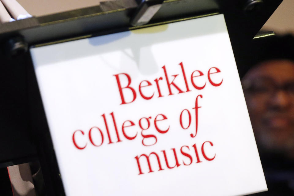 FILE - The Berklee College of Music sign is seen on a podium, Nov. 6, 2013, in Boston. A citizen of China who is a student at the Berklee College of Music was convicted Thursday, Jan. 25, 2024, of threatening a person who posted a flyer in support of democracy in China, authorities said. (AP Photo/Michael Dwyer, File)