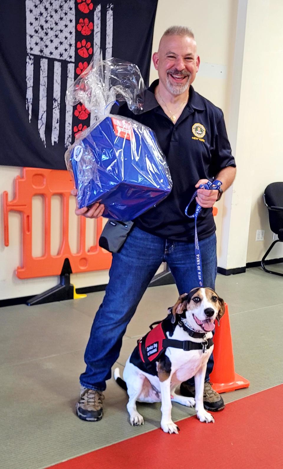 Rob Weisberg with his dog Chip.