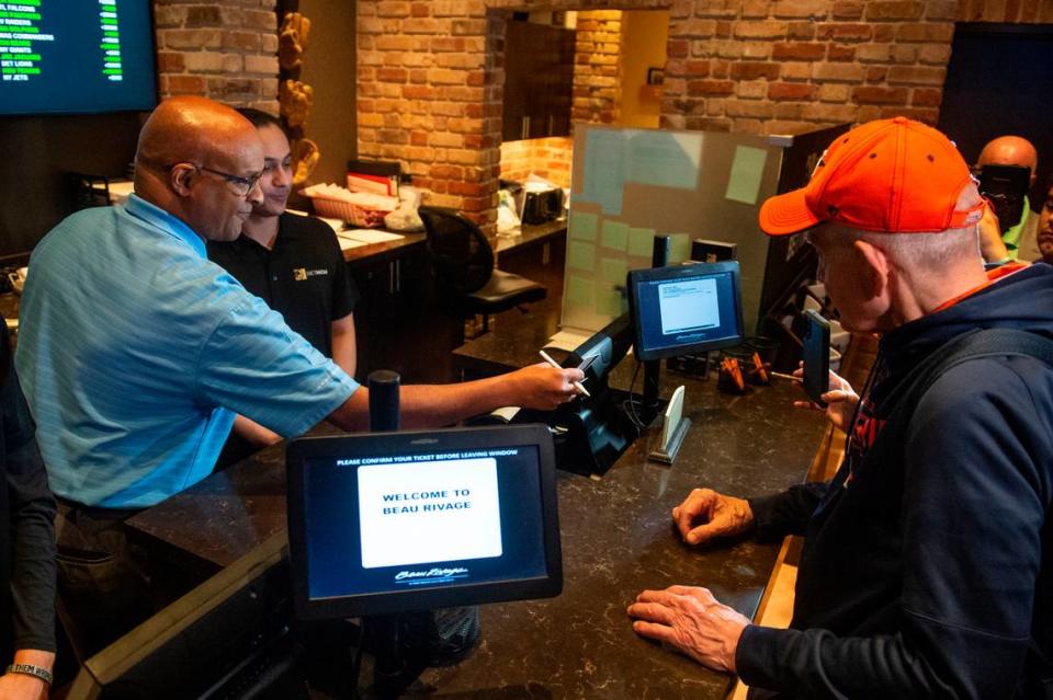 Jim McIngvale, better known as ‘Mattress Mack’, places a $500,000 bet that the Houston Cougars will be the winners of the 2023 NCAA Men’s Basketball Tournament at the Beau Rivage Casino in Biloxi on Tuesday, Nov. 15, 2022.