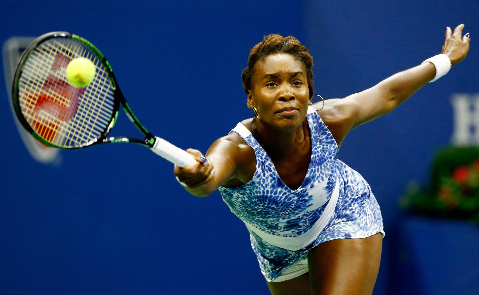 NEW YORK, NY - SEPTEMBER 08:   Venus Williams of the United States returns a shot to Serena Williams of the United States during their Women's Singles Quarterfinals Round match on Day Nine of the 2015 US Open at the USTA Billie Jean King National Tennis Center on September 8, 2015 in the Flushing neighborhood of the Queens borough of New York City.  (Photo by Al Bello/Getty Images)