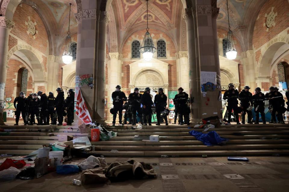 Police officers at Royce Hall at UCLA after pushing back pro-Palestinian protesters.