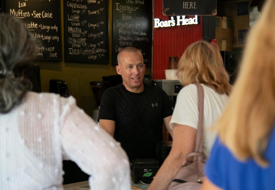 Sanibel Deli owner Jeff Weigel takes orders from customers on Wednesday, Nov. 30, 2022. Weigel reopened the Sanibel Deli after weeks of cleaning up after Hurricane Ian flooded his restaurant.