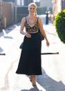 <p><em>Ted Lasso</em>'s Hannah Waddingham wears a black-and-gold ensemble to <em>Jimmy Kimmel Live!</em> on Sept. 15 in L.A.</p>