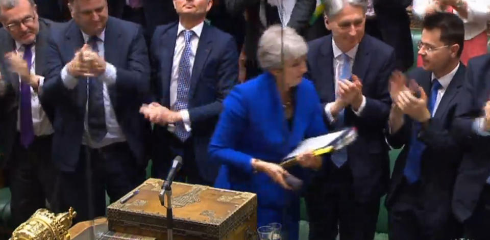 MPs applaud as Prime Minister Theresa May leaves following her final Prime Minister's Questions in the House of Commons, London.