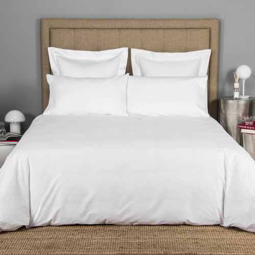 bed with frette percale white cotton sheets