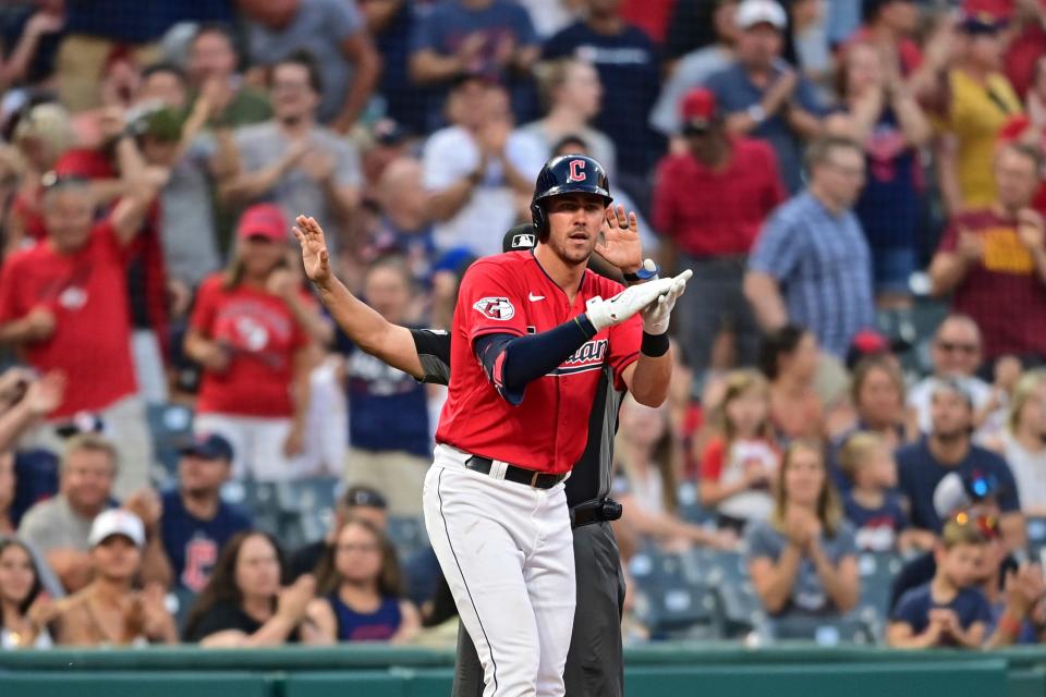 Guardians rookie outfiedler Nolan Jones celebrates after hitting a two-run double and advancing to third base on a throwing error by Chicago White Sox second baseman Leury Garcia in the fifth inning of Monday night's game in Cleveland. [David Dermer/Associated Press]