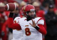 Calgary Dinos quarterback Andrew Buckley throws a pass against the Laval Rouge et Or during the Vanier Cup University Championship football game in Quebec City, Quebec, November 23, 2013. REUTERS/Mathieu Belanger (CANADA - Tags: SPORT FOOTBALL)