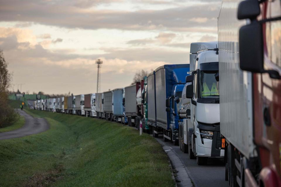 Lorries queue on a motorway as Polish hauliers use their vehicles to block access to the Ukrainian border crossing in Dorohusk (Wojtek Radwanski/AFP via Getty Images)