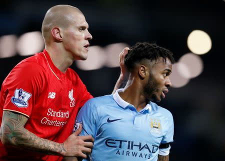 Football - Manchester City v Liverpool - Barclays Premier League - Etihad Stadium - 21/11/15 Manchester City's Raheem Sterling with Liverpool's Martin Skrtel Reuters / Phil Noble Livepic