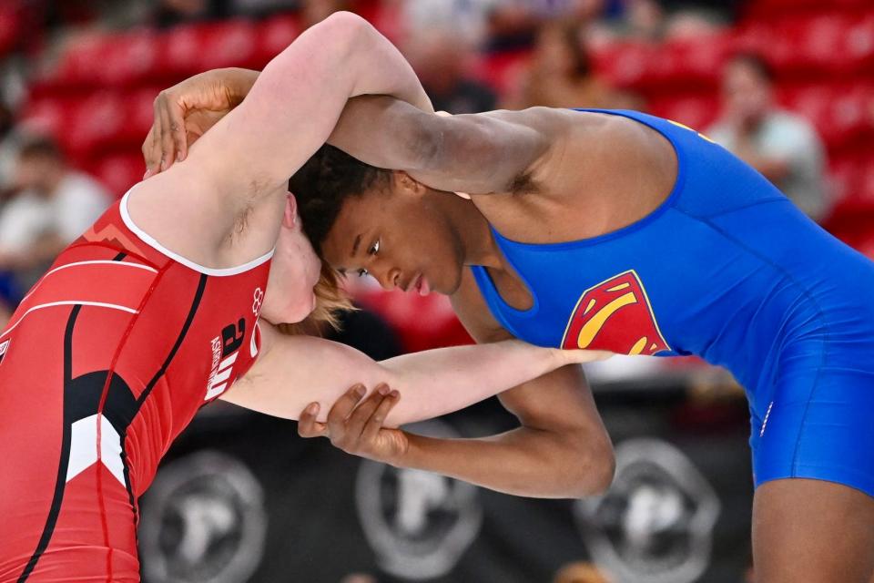 Fort Dodge's Dreshaun Ross (blue) took second at the Cadet freestyle world team trials at 92 kilograms (202 pounds) at USA Wrestling's U.S. Open events in Las Vegas.