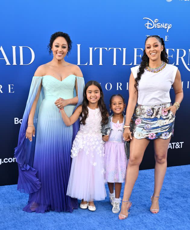 Tamera Mowry-Housley with her daughter, Ariah, and Tia Mowry with her daughter, Cairo, attend the world premiere of Disney&#39;s live-action 