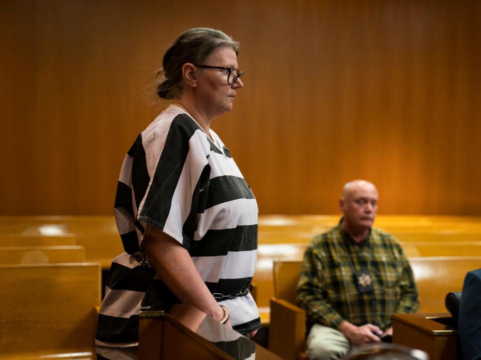 Jennifer Crumbley makes her way into the Oakland County Courtroom of Judge Cheryl Matthews on Wednesday, Dec. 13, 2023.