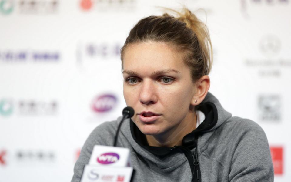 Simona Halep is suffering with a lower back injury - Visual China Group