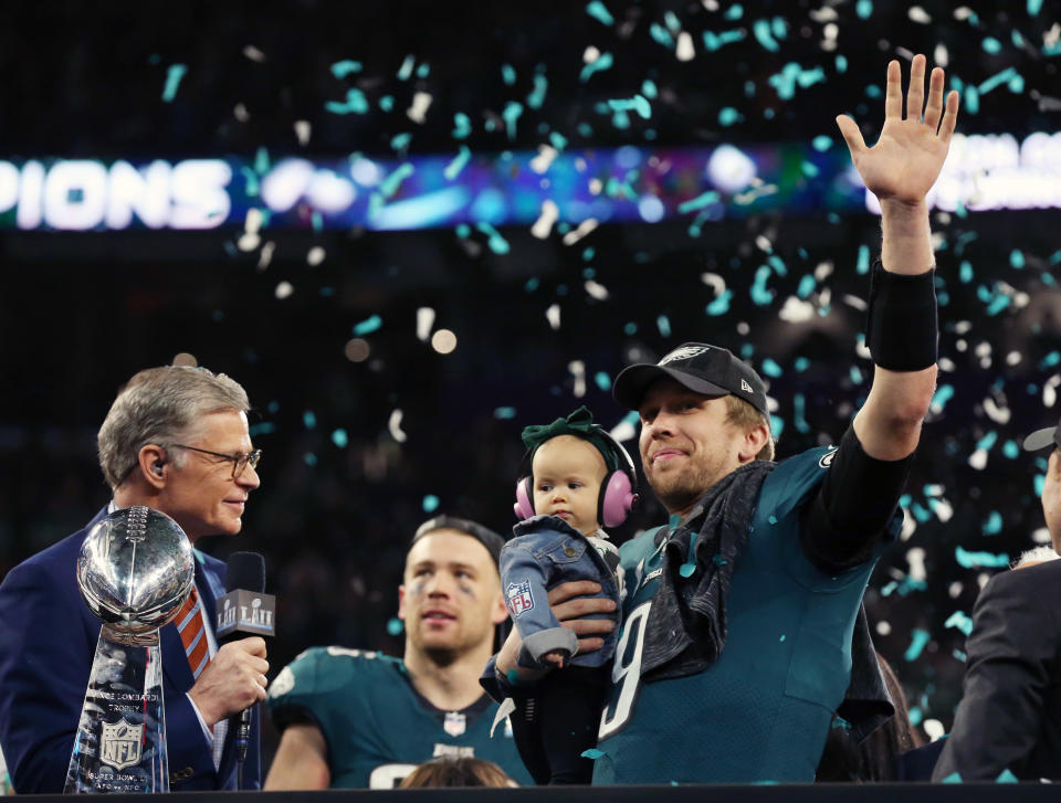 <p>Philadelphia Eagles quarterback Nick Foles (9) celebrates with his daughter Lily Foles after defeating the New England Patriots 41-33 in Super Bowl LII at U.S. Bank Stadium. Mandatory Credit: Matthew Emmons-USA TODAY Sports </p>