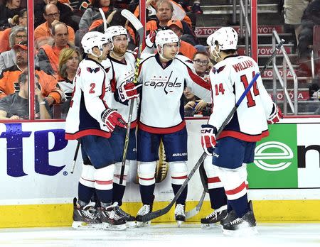 Apr 18, 2016; Philadelphia, PA, USA; Washington Capitals center Evgeny Kuznetsov (92) celebrates his goal with teammates against the Philadelphia Flyers during the third period in game three of the first round of the 2016 Stanley Cup Playoffs at Wells Fargo Center. The Capitals defeated the Flyers, 6-1. Eric Hartline-USA TODAY Sports