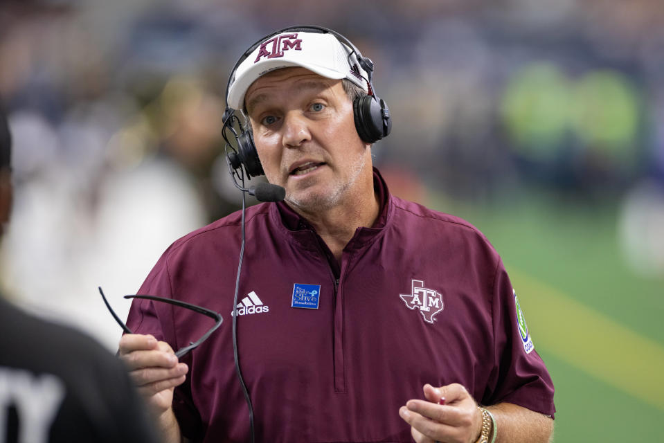 ARLINGTON, TX - SEPTEMBER 25: Texas A&M Aggies head coach Jimbo Fisher is interviewed on the field during the  Southwest Classic college football game between the Texas A&M Aggies and Arkansas Razorbacks on September 25, 2021 at AT&T Stadium in Arlington, TX.  (Photo by Matthew Visinsky/Icon Sportswire via Getty Images)