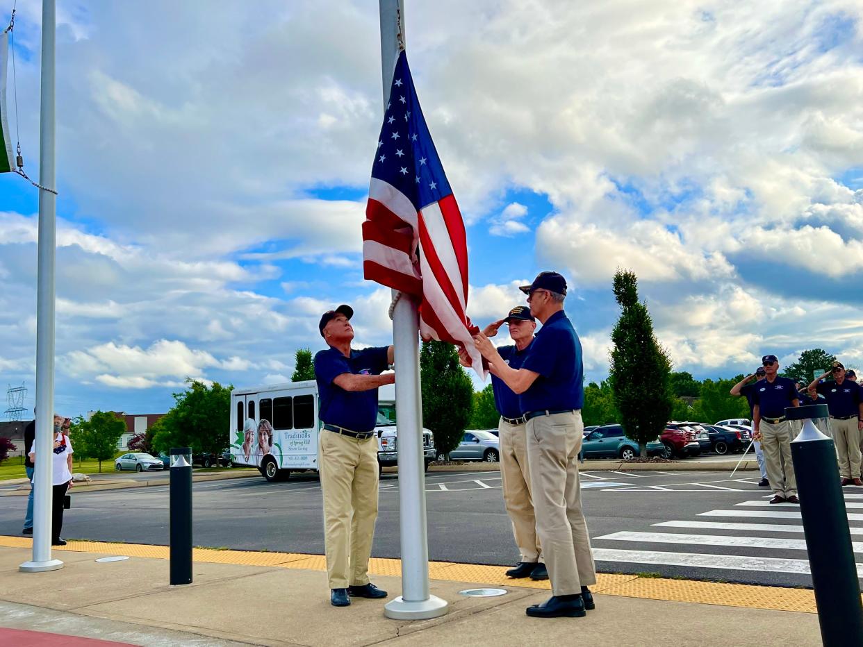 The Southern Springs Veterans Club raises the U.S. Flag to half mast during the 2022 Memorial Day Celebration at Fischer Park at Port Royal on Friday, May 27, 2022.