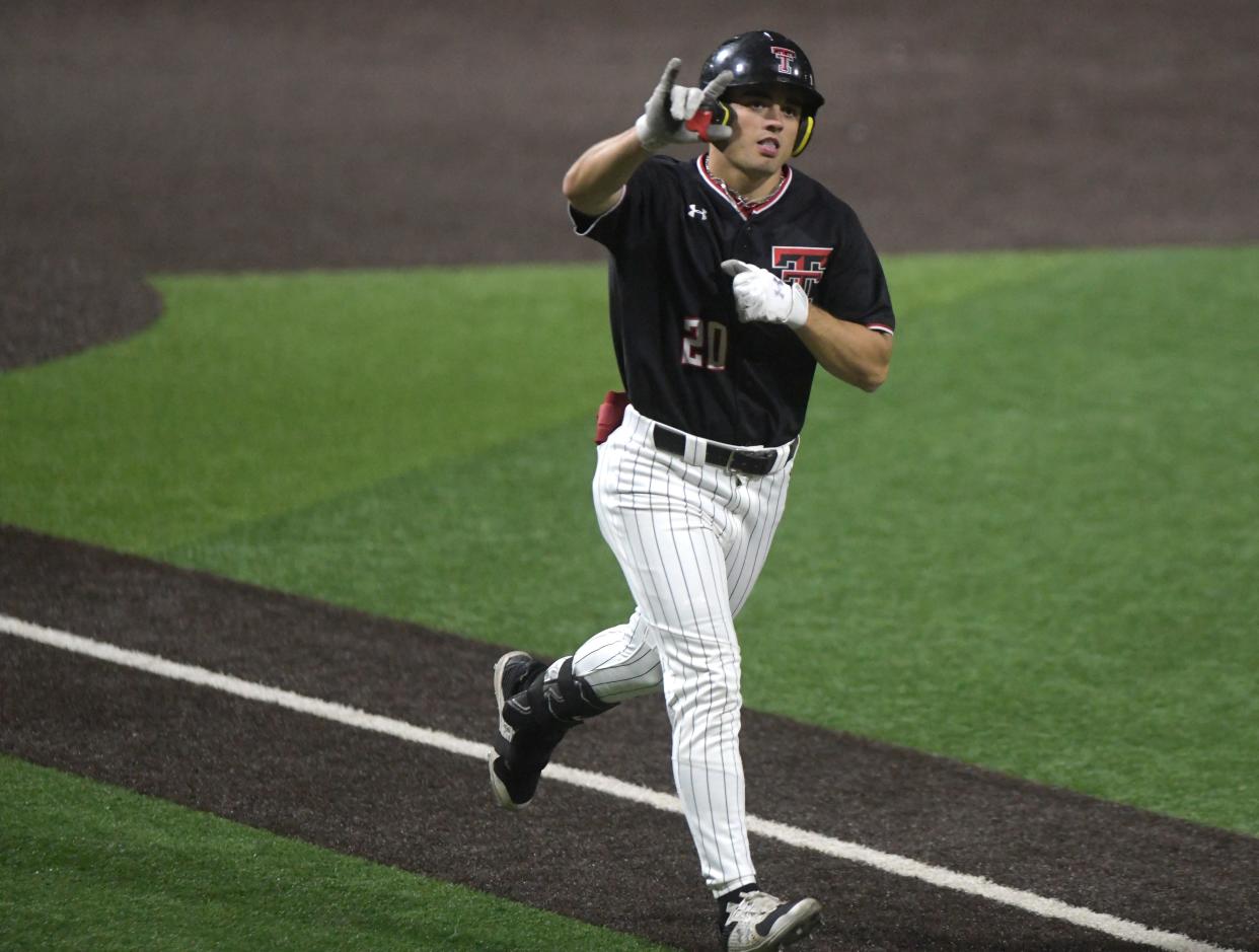 Texas Tech right fielder Austin Green, shown in a March 21 game against Brigham Young, doubled twice and hit a grand slam Friday night as the Red Raiders beat No. 24 West Virginia 15-2 in a Big 12 baseball series opener.