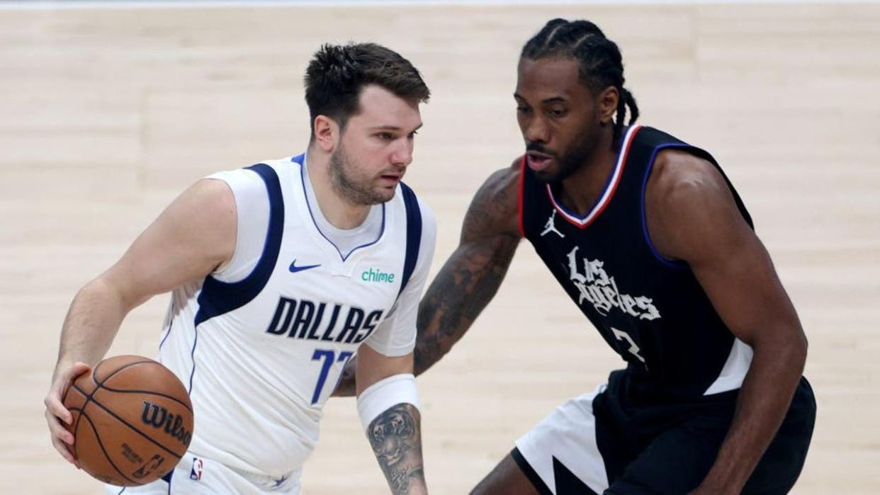 <div>Luka Doncic #77 of the Dallas Mavericks and Kawhi Leonard #2 of the LA Clippers. (Photo by Harry How/Getty Images)</div> <strong>(Getty Images)</strong>