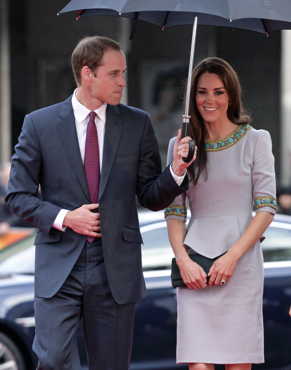 <div class="caption-credit">Photo by: Indigo/Getty Images</div> <br><div class="caption-title"><b>But most of the time, he's just her umbrella guy.</b></div> All year long Will has been hyper-vigilant about protecting his lady from freshly falling dew. This week, he played <a href="http://yhoo.it/IfulmC" rel="nofollow noopener" target="_blank" data-ylk="slk:rain-cop at a movie premiere;elm:context_link;itc:0;sec:content-canvas" class="link ">rain-cop at a movie premiere</a>, holding the umbrella over Kate's head like a besotted bodyguard. Since their engagement, they've cut a good-looking portrait, but lately, they're hitting their stride. He gives her confidence, she gives him swagger. And together, they lived happily ever after year one. <br> <br> <b>More Will and Kate news: <br></b> <a href="http://yhoo.it/Kgw9bZ" rel="nofollow noopener" target="_blank" data-ylk="slk:Barbie's anniversary gift for Will and Kate;elm:context_link;itc:0;sec:content-canvas" class="link ">Barbie's anniversary gift for Will and Kate <br></a> <a href="http://yhoo.it/JKgVP0" rel="nofollow noopener" target="_blank" data-ylk="slk:Video: Will and Kate in wax;elm:context_link;itc:0;sec:content-canvas" class="link ">Video: Will and Kate in wax <br></a> <a href="http://yhoo.it/IfulmC" rel="nofollow noopener" target="_blank" data-ylk="slk:A royal date night;elm:context_link;itc:0;sec:content-canvas" class="link ">A royal date night</a> <br> <a href="http://yhoo.it/IZzJvW" rel="nofollow noopener" target="_blank" data-ylk="slk:Year one collectibles;elm:context_link;itc:0;sec:content-canvas" class="link ">Year one collectibles</a>