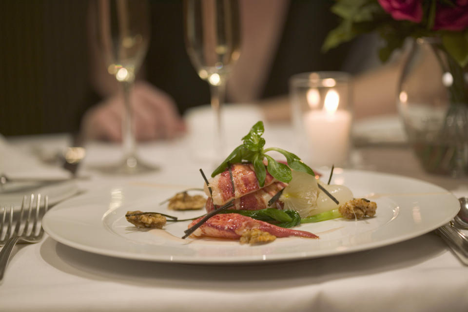 A fancy dinner is being shown