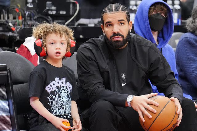 Mark Blinch/Getty Images Drake and his son Adonis