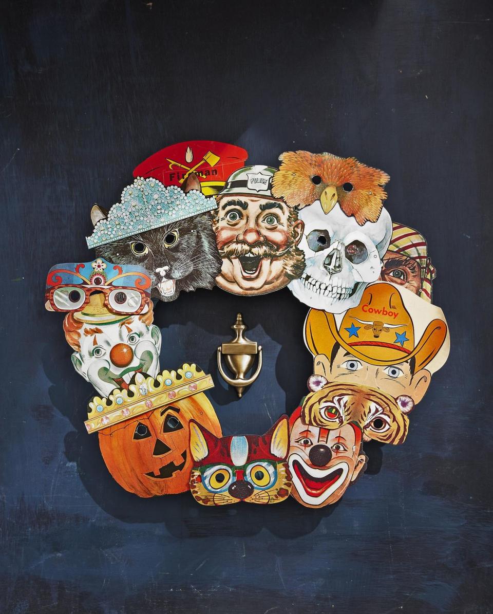 <p>It will only take a few minutes to craft this friendly Halloween focused wreath.<br><br>Source colorful vintage paper masks from websites like Etsy and eBay—you will need 10 to 15 total. Attach to an 18-inch craft<br>ring with a dab of hot-glue, layering and overlapping them as you go.<br></p>
