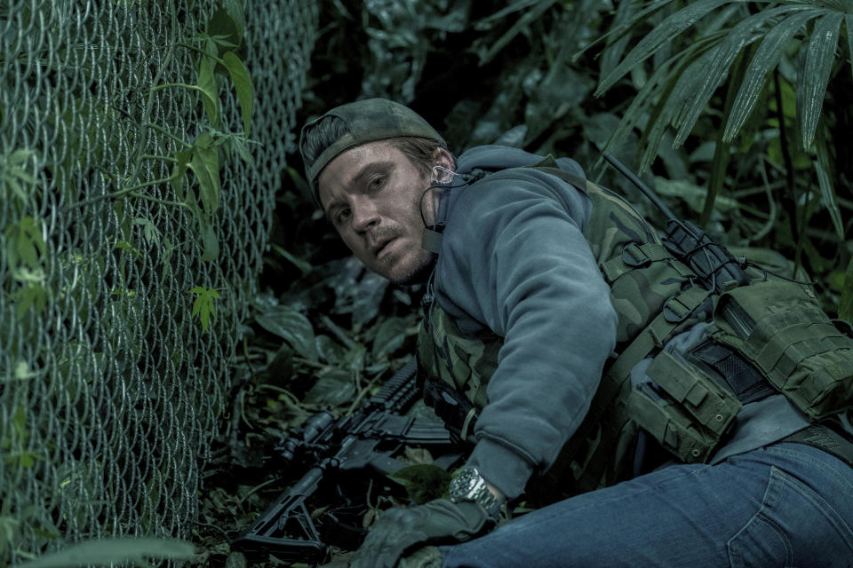 This image released by Netflix, shows Garrett Hedlund in a scene from the film, "Triple Frontier." (Melinda Sue Gordon/Netflix via AP)