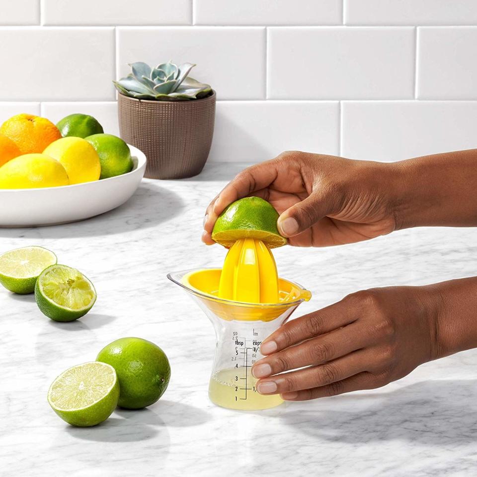 Citrus Juicer with Built-In Measurement Cup and Strainer