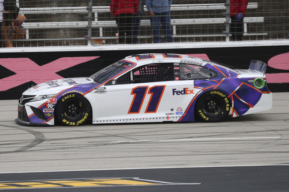 Denny Hamlin (11) drives down the front stretch during a NASCAR Cup Series auto race at Texas Motor Speedway in Fort Worth, Texas, Sunday, Oct. 25, 2020. (AP Photo/Richard W. Rodriguez)