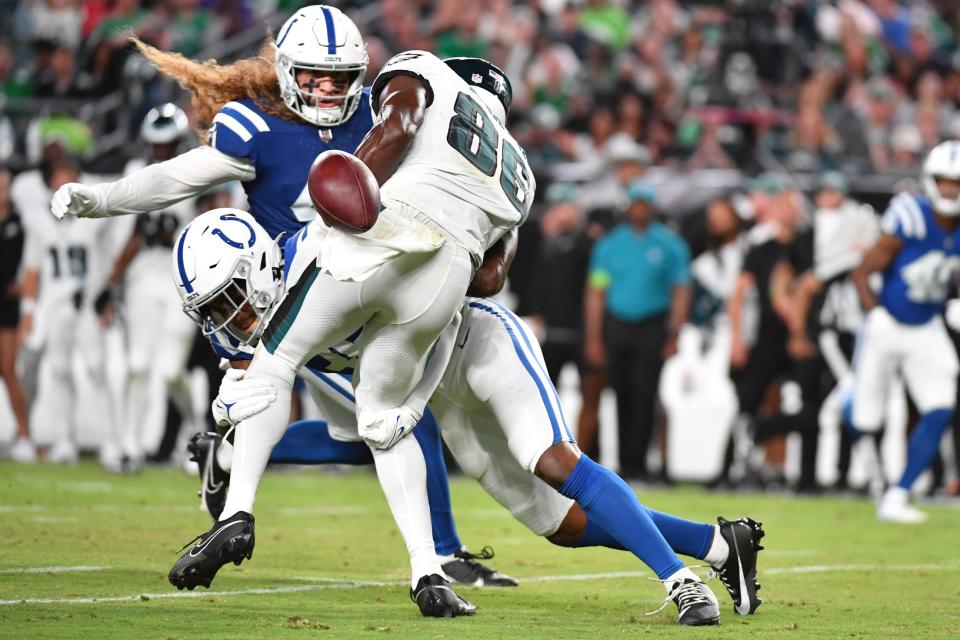 Aug 24, 2023; Philadelphia, Pennsylvania, USA; Philadelphia Eagles wide receiver Joseph Ngata (86) fumbles the ball after being hit by Indianapolis Colts safety Teez Tabor (35) during the second quarter at Lincoln Financial Field. Mandatory Credit: Eric Hartline-USA TODAY Sports