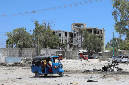 A rickshaw is seen near the scene of a suicide explosion after al-Shabaab militia stormed a government building in Mogadishu, Somalia March 23, 2019. REUTERS/Feisal Omar