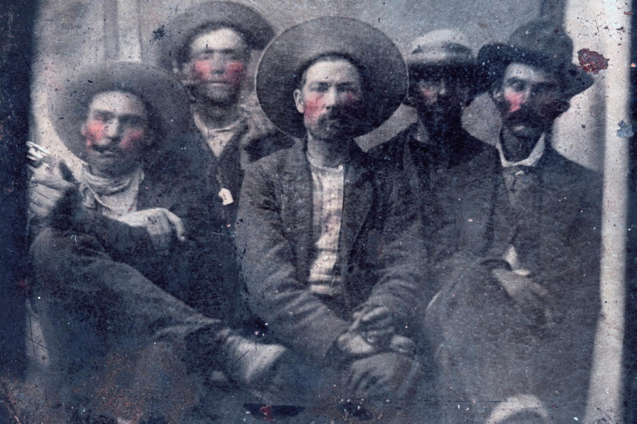 A rare photograph shows Billy the Kid, second from left, and Pat Garrett, far right, taken in the 1800s: Courtesy of Frank Abrams via AP