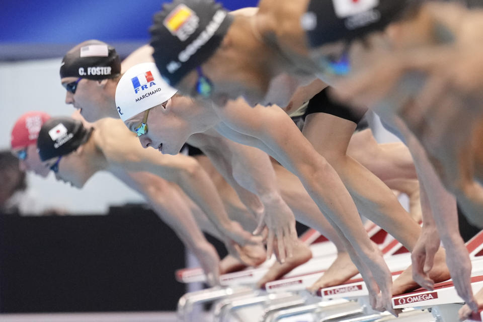 Leon Marchand of France compete3s during the men's 200m individual medley final at the World Swimming Championships in Fukuoka, Japan, Thursday, July 27, 2023. (AP Photo/Eugene Hoshiko)
