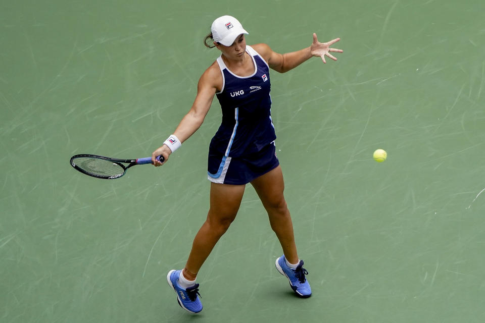 Ashleigh Barty, of Australia, returns a shot to Vera Zvonareva, of Russia, during the first round of the US Open tennis championships, Tuesday, Aug. 31, 2021, in New York. (AP Photo/John Minchillo)