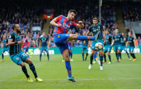 <p>Scott Dann in action in action with Southampton’s Nathan Redmond REUTERS/David Klein </p>