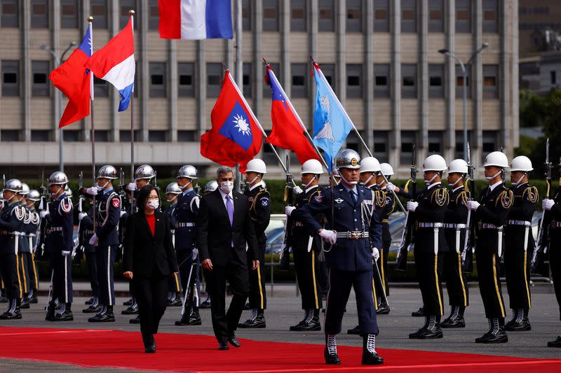 Taiwan President Tsai Ing-wen and visiting Paraguay President Mario Abdo Benitez attend a welcome ceremony in Taipei