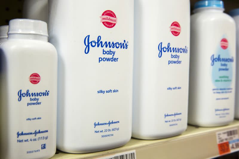 FILE PHOTO: Bottles of Johnson & Johnson baby powder line a drugstore shelf in New York