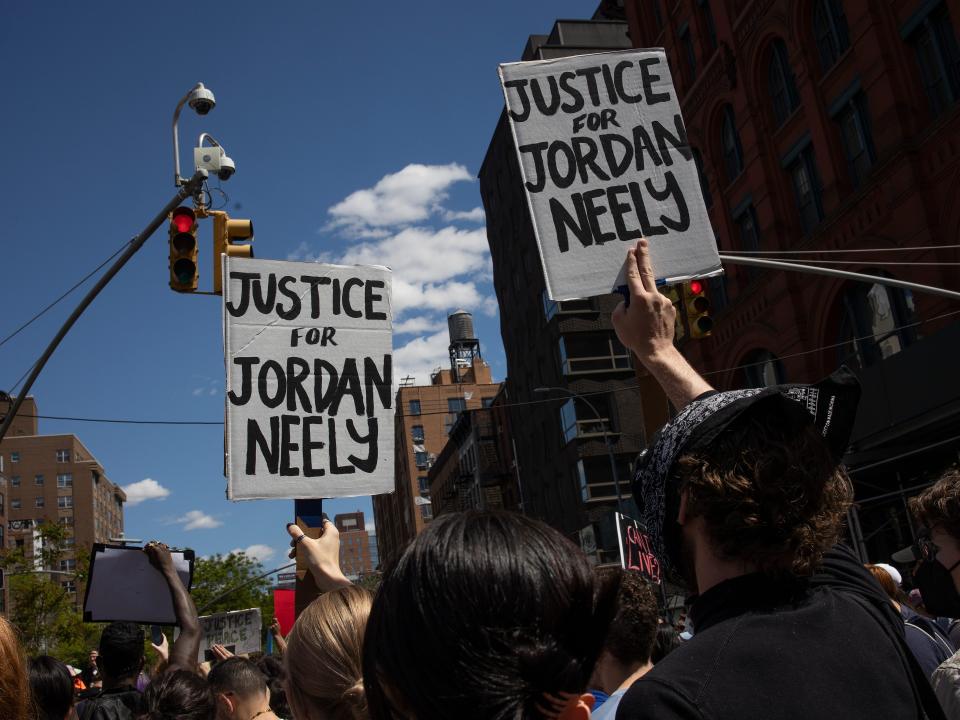Black Lives Matter protestors march through the streets to demand justice for Jordan Neely.