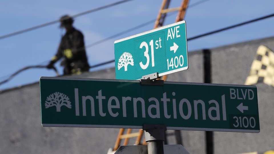 Firefighters work at the aftermath of a warehouse fire in the Fruitvale district of Oakland at the corner of 31st. Source: AAP