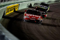 HOMESTEAD, FL - NOVEMBER 20: Tony Stewart, driver of the #14 Office Depot/Mobil 1 Chevrolet, leads Jeff Gordon, driver of the #24 Drive to End Hunger Chevrolet, and Carl Edwards, driver of the #99 Aflac Ford, during the NASCAR Sprint Cup Series Ford 400 at Homestead-Miami Speedway on November 20, 2011 in Homestead, Florida. (Photo by Chris Trotman/Getty Images for NASCAR)