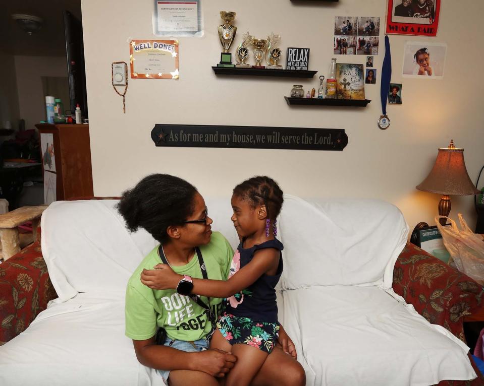 Terah Coleman and her daughter Aliyah, 5, at their apartment in Green. Coleman participates in the Jobs On Board for Success (JOBS) program, an organization that helps young and at-risk moms gain employment develop skills for a career.