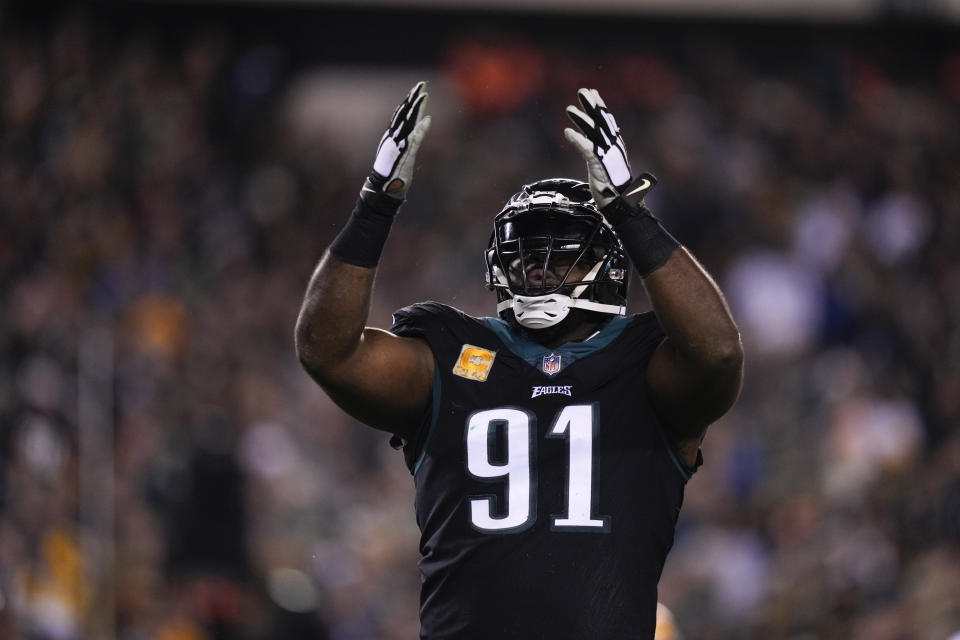 Philadelphia Eagles' Fletcher Cox reacts after sacking Green Bay Packers quarterback Aaron Rodgers during the first half of an NFL football game, Sunday, Nov. 27, 2022, in Philadelphia. (AP Photo/Matt Slocum)