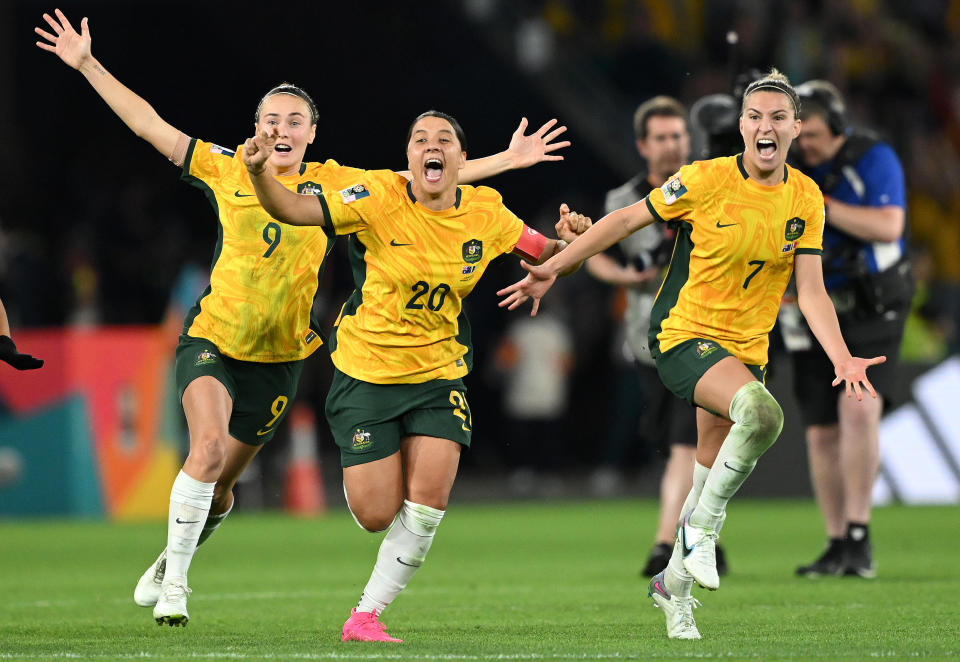 Sam Kerr, Caitlin Foord and Steph Catley celebrate the win.