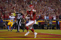Kansas City Chiefs wide receiver Justin Watson celebrates after scoring during the second half of an NFL football game against the Los Angeles Chargers Thursday, Sept. 15, 2022, in Kansas City, Mo. (AP Photo/Ed Zurga)