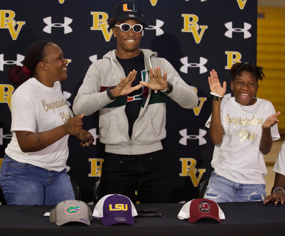 Chris Graves announces his commitment to the University of Miami with his mom Tamila Lockley and his little brother Jerry Kemp by his side on Friday, July 9, 2021, at Bishop Verot High School in Fort Myers.